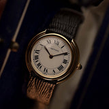 1970年代卡地亞 Vendôme 復古腕錶，18K 黃金錶殼，白色 MK2 錶盤，自動上鏈機芯，黑色背景