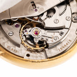 Closeup of a Vintage IWC de Luxe automatic 18k 1959 Movement. 35mm with 18k Yellow Gold Case, Automatic Caliber 8531, flawless Pie Pan Dial and Leather Strap.