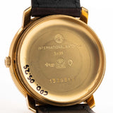 Closeup of a Vintage IWC de Luxe automatic 18k 1959 Case. 35mm with 18k Yellow Gold Case, Automatic Caliber 8531, flawless Pie Pan Dial and Leather Strap.