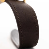 Closeup of a Vintage IWC de Luxe automatic 18k 1959 Leather Strap. 35mm with 18k Yellow Gold Case, Automatic Caliber 8531, flawless Pie Pan Dial and Leather Strap.