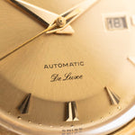 Closeup of a Vintage IWC de Luxe automatic 18k 1959 Dial. 35mm with 18k Yellow Gold Case, Automatic Caliber 8531, flawless Pie Pan Dial and Leather Strap.