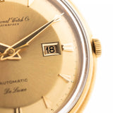 Closeup of a Vintage IWC de Luxe automatic 18k 1959 Dial. 35mm with 18k Yellow Gold Case, Automatic Caliber 8531, flawless Pie Pan Dial and Leather Strap.