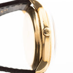 Closeup of a Vintage IWC de Luxe automatic 18k 1959 Case. 35mm with 18k Yellow Gold Case, Automatic Caliber 8531, flawless Pie Pan Dial and Leather Strap.