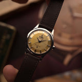 Omega Constellation 2852 pie-pan dial with crosshair and arrowhead markers close-up, steel