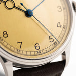 Vintage Omega Art Deco Pontife 1939 stainless steel case and golden dial