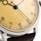 Vintage Omega Art Deco Pontife 1939 stainless steel case and golden dial