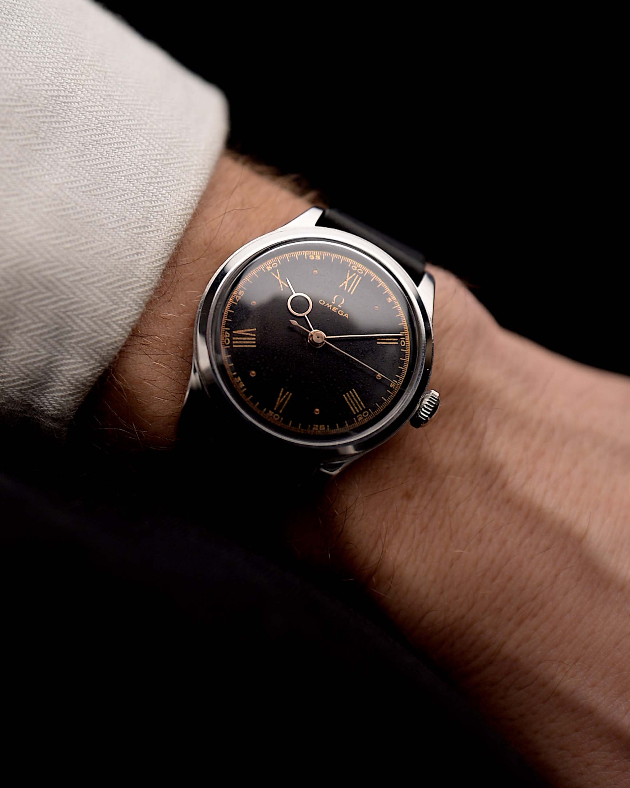 Photo of Omega Art Deco Pontife Roman Black 1939 on wrist - Ref 243 - GOLDAMMER