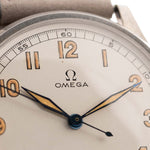 Closeup of a Vintage Omega Jumbo Radium from 1935 Silver Railroad Dial. 37.5mm with Stainless Steel Case, Manual Wind Movement, Original Silver Railroad Dial and Leather Strap.