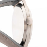 Closeup of a Vintage Omega Jumbo Radium from 1935 Case. 37.5mm with Stainless Steel Case, Manual Wind Movement, Original Silver Railroad Dial and Leather Strap.