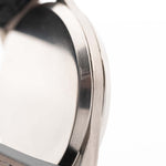 Closeup of a Vintage Omega Jumbo Radium from 1935 Case. 37.5mm with Stainless Steel Case, Manual Wind Movement, Original Silver Railroad Dial and Leather Strap.