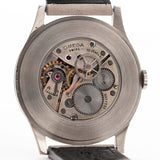 Closeup of a Vintage Omega Jumbo Radium from 1935 Movement. 37.5mm with Stainless Steel Case, Manual Wind Movement, Original Silver Railroad Dial and Leather Strap.
