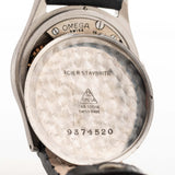 Closeup Photo of a Omega Radium Sword Arabic  from 1935 on a wrist. 28mm case in Stainless Steel with Manual wind movement, Original golden dial, Radium lume and Leather strap.