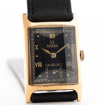 Vintage Omega Tank Gilt watch Roman from 1944. 18mm wide with 18k Rose Gold Case, Manual Wind Movement, Black Gilt Dial, Roman Numerals and Black Leather Strap.