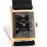 Vintage Omega Tank Gilt watch Roman from 1944. 18mm wide with 18k Rose Gold Case, Manual Wind Movement, Black Gilt Dial, Roman Numerals and Black Leather Strap.