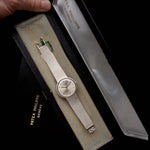 Closeup Photo of a Patek Philippe 3520 Calatrava 18k from the 1970s in Box. 32mm 18k White Gold Case with Manual Wind Movement, Original Silver Sunburst Dial and White Gold Bracelet.