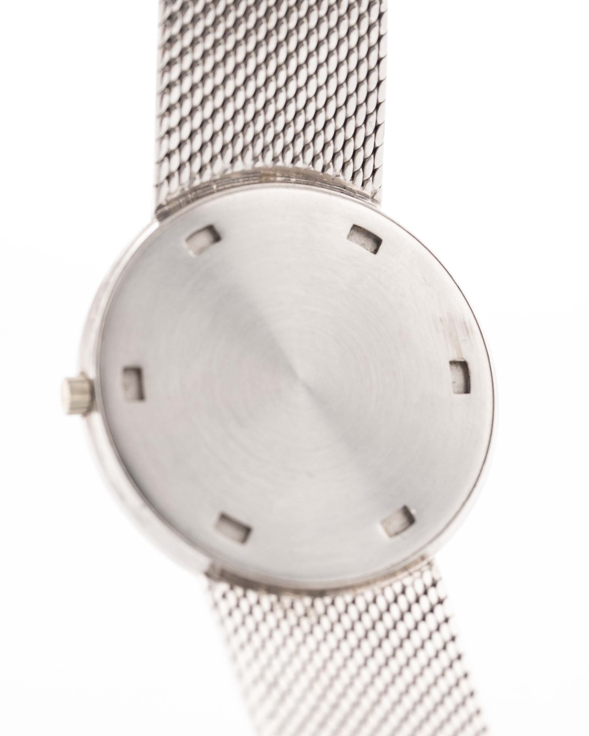 Closeup Photo of a Patek Philippe 3520 Calatrava 18k from the 1970s. 32mm 18k White Gold Case with Manual Wind Movement, Original Silver Sunburst Dial and White Gold Bracelet.
