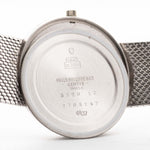 Closeup Photo of a Patek Philippe 3520 Calatrava 18k from the 1970s. 32mm 18k White Gold Case with Manual Wind Movement, Original Silver Sunburst Dial and White Gold Bracelet.