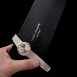 Closeup Photo of a Patek Philippe 3520 Calatrava 18k from the 1970s with Box. 32mm 18k White Gold Case with Manual Wind Movement, Original Silver Sunburst Dial and White Gold Bracelet.