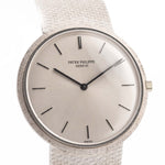 Closeup Photo of a Patek Philippe 3520 Calatrava 18k from the 1970s. 32mm 18k White Gold Case with Manual Wind Movement, Original Silver Sunburst Dial and White Gold Bracelet.