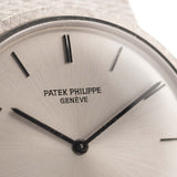 Closeup Photo of a Patek Philippe 3520 Calatrava 18k from the 1970s. 32mm 18k White Gold Case with Manual Wind Movement, Original Silver Sunburst Dial and White Gold Bracelet.