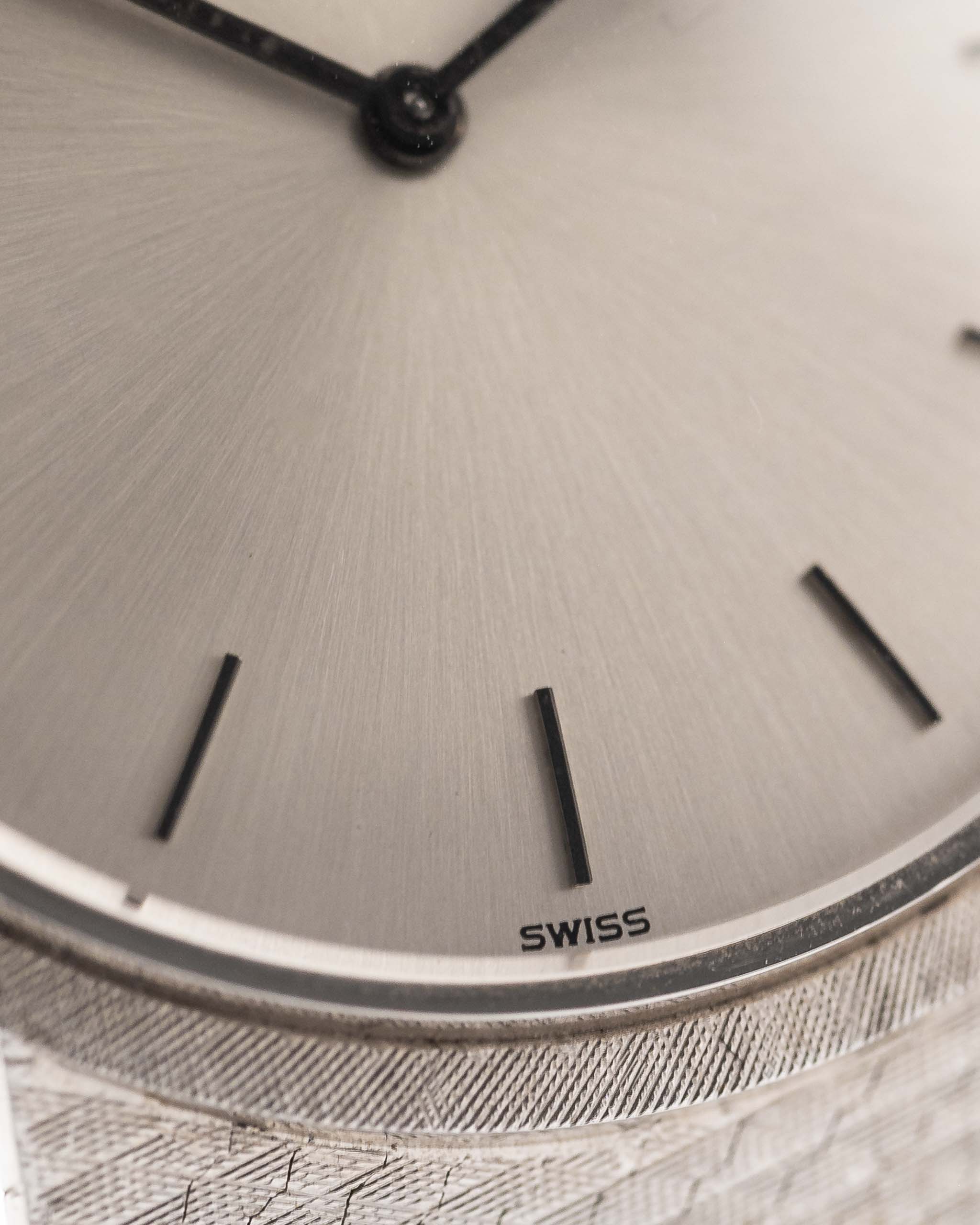 Closeup Photo of a Patek Philippe 3520 Calatrava 18k from the 1970s. 32mm 18k White Gold Case with Manual Wind Movement, Original Silver Sunburst Dial and White Gold Bracelet.