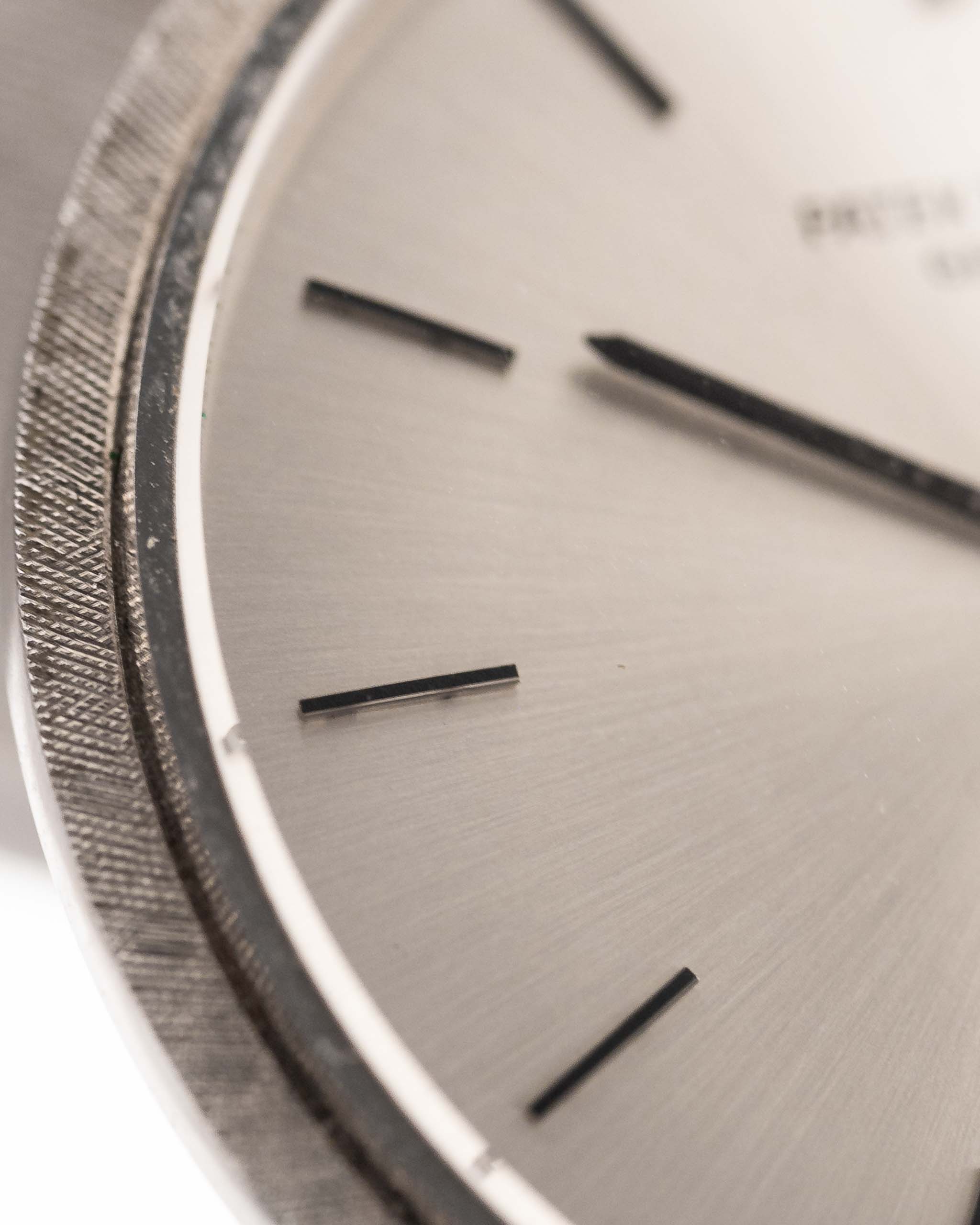Closeup Photo of a Patek Philippe 3520 Calatrava 18k from the 1970s. 32mm 18k White Gold Case with Manual Wind Movement, Original Silver Sunburst Dial and White Gold Bracelet.