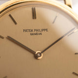 Patek Philippe 3520 Calatrava Ref. 3520 from the 1960s. 32mm in 18k Yellow Gold with Manual Wind Movement, Original Golden Brushed Dial and Leather Strap.