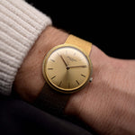 Patek Philippe Calatrava yellow gold 3520 1970 - patek philippe watch - 18k yellow gold case - golden colored sunburst dial - integrated 18k yellow gold bracelet