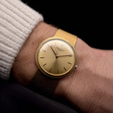 Patek Philippe Calatrava yellow gold 3520 1970 - patek philippe watch - 18k yellow gold case - golden colored sunburst dial - integrated 18k yellow gold bracelet