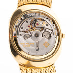Closeup Photo of a Vintage Patek Philippe Ellipse 3605 Jumbo from 1978. 33mm in 18k Yellow Gold with Automatic Cal. 28-255 C, Gilt Sigma Dial and Integrated Gold Bracelet.