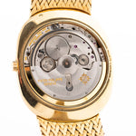Closeup Photo of a Vintage Patek Philippe Ellipse 3605 Jumbo from 1978. 33mm in 18k Yellow Gold with Automatic Cal. 28-255 C, Gilt Sigma Dial and Integrated Gold Bracelet.