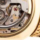 Closeup Photo of a Vintage Patek Philippe Ellipse 3605 Jumbo Movement from 1978. 33mm in 18k Yellow Gold with Automatic Cal. 28-255 C, Gilt Sigma Dial and Integrated Gold Bracelet.