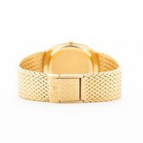 Closeup Photo of a Vintage Patek Philippe Ellipse 3605 Jumbo gold bracelet from 1978. 33mm in 18k Yellow Gold with Automatic Cal. 28-255 C, Gilt Sigma Dial and Integrated Gold Bracelet.