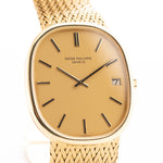 Closeup Photo of a Vintage Patek Philippe Ellipse 3605 Jumbo from 1978. 33mm in 18k Yellow Gold with Automatic Cal. 28-255 C, Gilt Sigma Dial and Integrated Gold Bracelet.