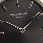 Vintage Patek Philippe Ellipse 3738 Grey 18k white gold 1980s with grey sunburst dial closeup Hands and markers