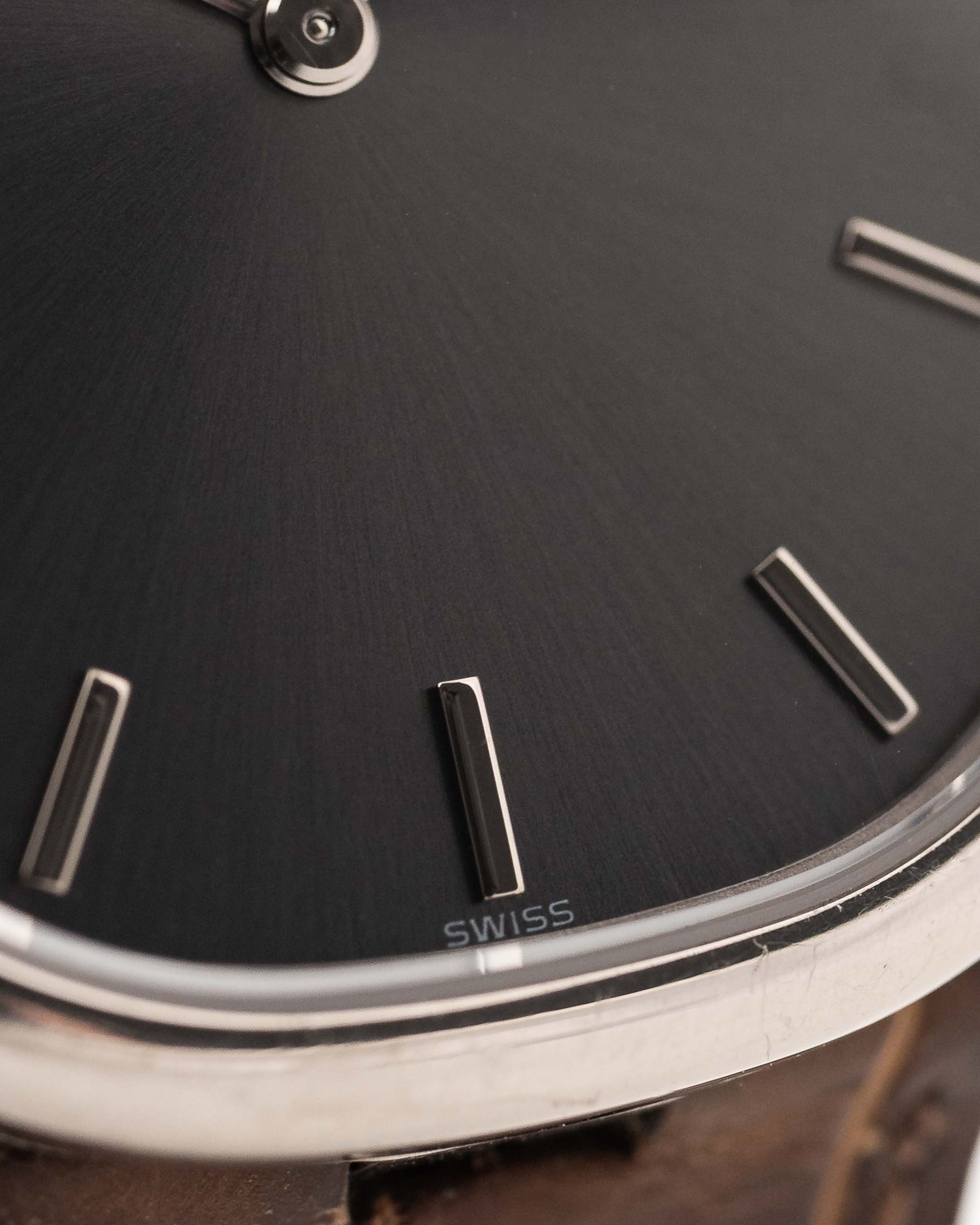 Patek Philippe Ellipse 3738 Grey 18k white gold 1980s with grey sunburst dial closeup Markers