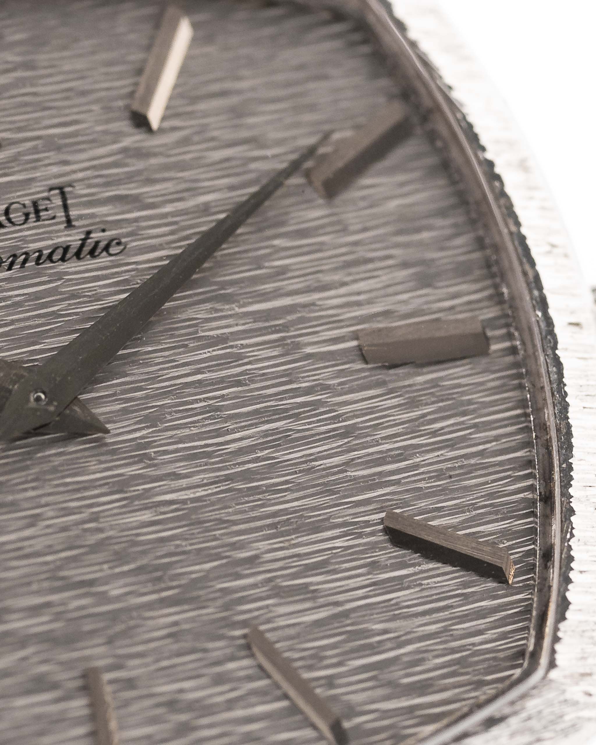 Closeup Photo of a Piaget 12401 Automatic 18k TV Bark from the 1970s on a wrist. 32.5mm with 18k White Gold Case, Automatic Movement, White Gold Hammered Dial and Integrated 18k.