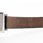 Closeup Photo of a Piaget Protocole 927 18k White Gold from the 1970s. 25mm in 18k White Gold with Manual wind movement, Silver sunburst dial and Original black leather strap.