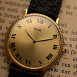 Piaget Altiplano 9036 vintage watch, golden Roman-numeral dial close-up, ultra-thin 18k gold