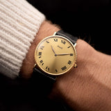 Piaget Altiplano 9036 vintage watch, 18k gold, champagne Roman-numeral dial, worn on the wrist