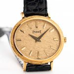 Vintage Piaget Ellipse Watch 9801 Bark 18k from the 1970s with 18k Yellow Gold Case, Flawless Bark-Finished Dial, Manual Wind Movement and Leather Strap.