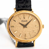 Vintage Piaget Ellipse Watch 9801 Bark 18k from the 1970s with 18k Yellow Gold Case, Flawless Bark-Finished Dial, Manual Wind Movement and Leather Strap.