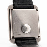 Closeup Photo of a Piaget Protocole 74101 Onyx 18k Diamond from the 1980s on a wrist. 26mm 18k White Gold Case with Onyx Dial with 4 Diamonds, Quartz Movement and Original Leather Strap.