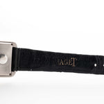 Closeup Photo of a Piaget Protocole 74101 Onyx 18k Diamond from the 1980s on a wrist. 26mm 18k White Gold Case with Onyx Dial with 4 Diamonds, Quartz Movement and Original Leather Strap.
