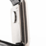 Closeup Photo of a Piaget Protocole 74101 Onyx 18k Diamond from the 1980s on a wrist. 26mm 18k White Gold Case with Onyx Dial with 4 Diamonds, Quartz Movement and Original Leather Strap.