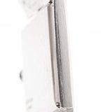 Closeup Photo of a Piaget Protocole 9133 Bark 18k from the 1970s. 23mm in 18k white gold with Manual wind movement, Original bark finish dial and Integrated bracelet.