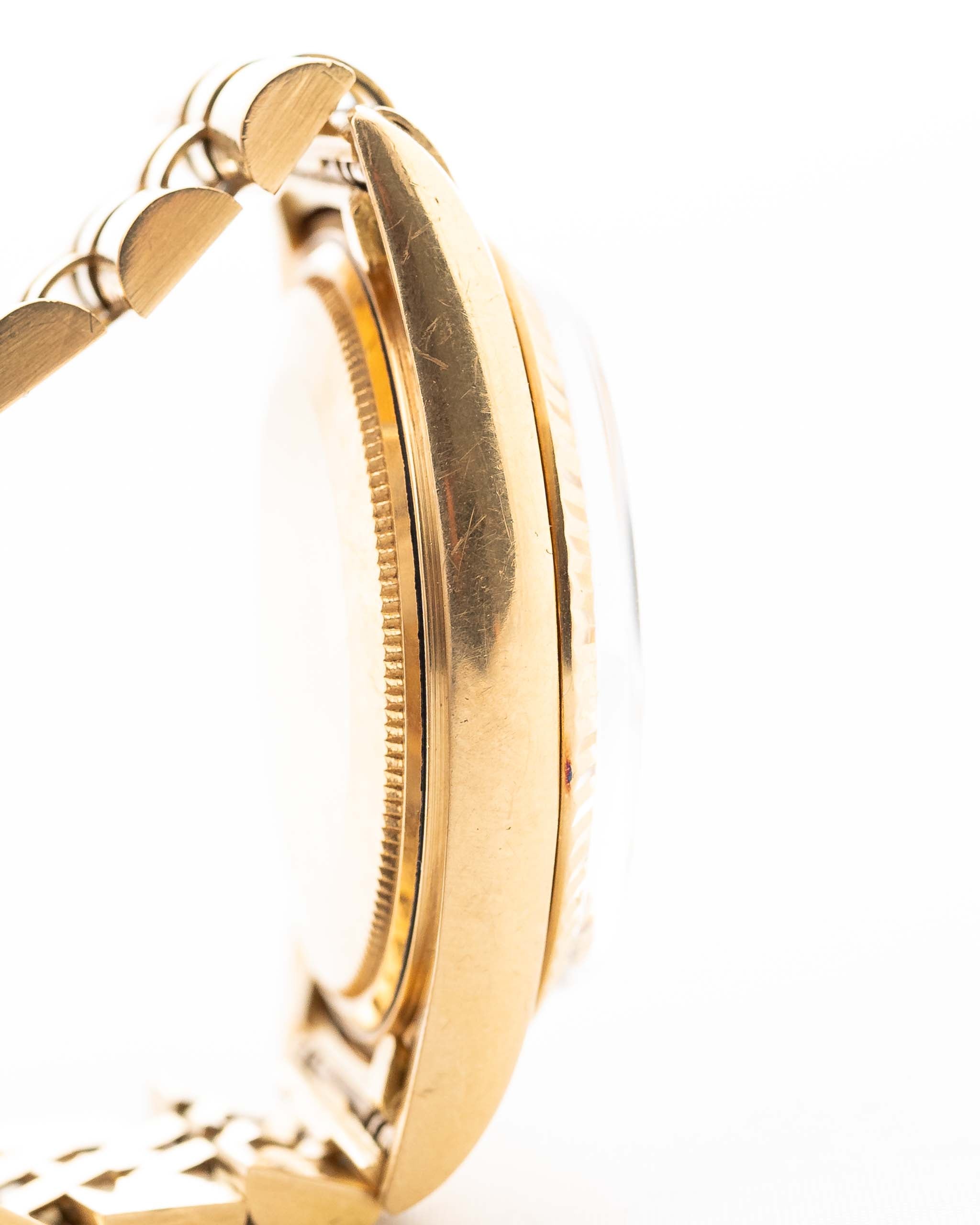Closeup Photo of a Rolex 1601 Datejust 18k Malachite Case. From 1968, 36mm in 18K Yellow Gold with Original Malachite Dial, Automatic Caliber 1570 and Original Jubilee Bracelet.