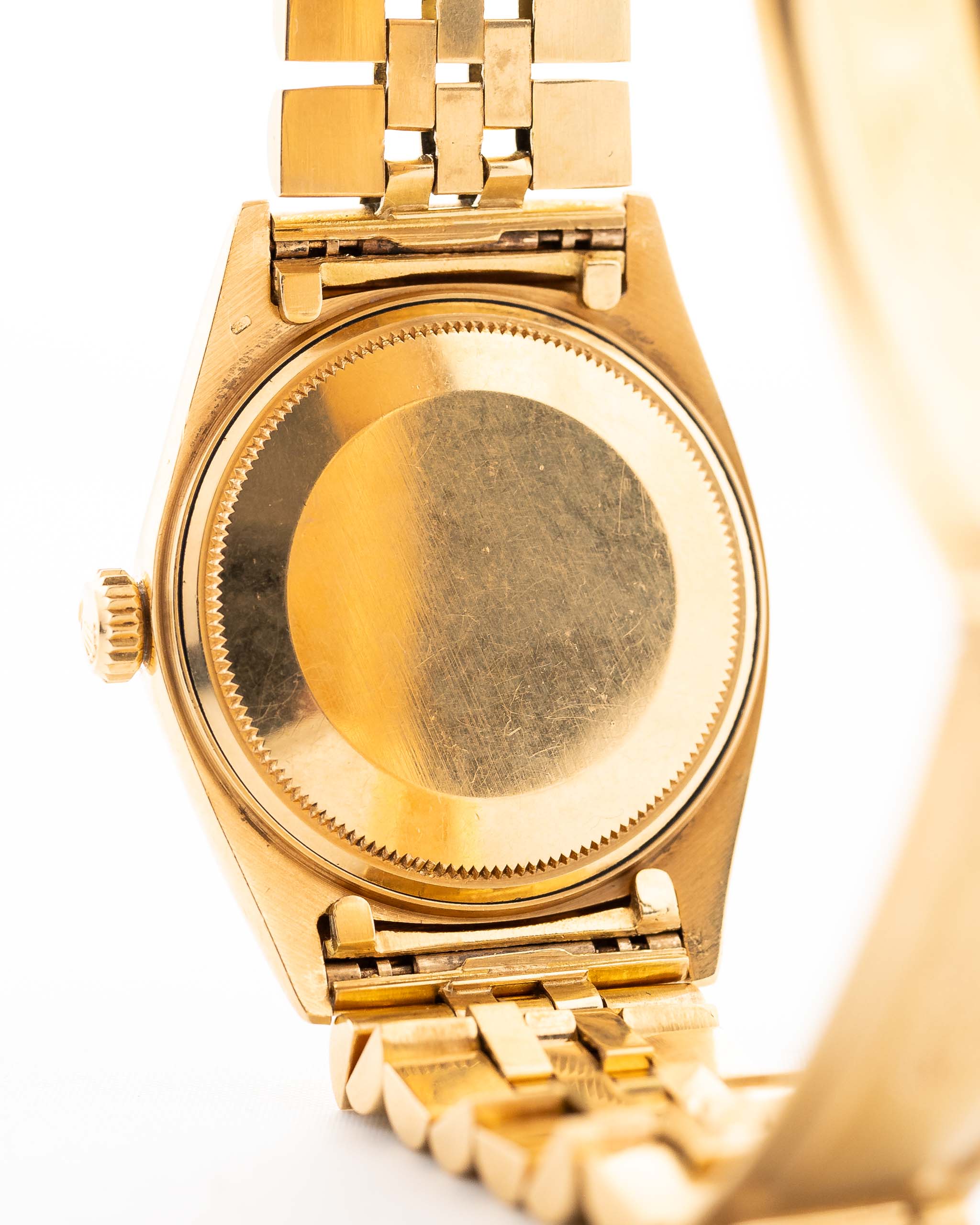 Closeup Photo of a Rolex 1601 Datejust 18k Malachite Case back. From 1968, 36mm in 18K Yellow Gold with Original Malachite Dial, Automatic Caliber 1570 and Original Jubilee Bracelet.