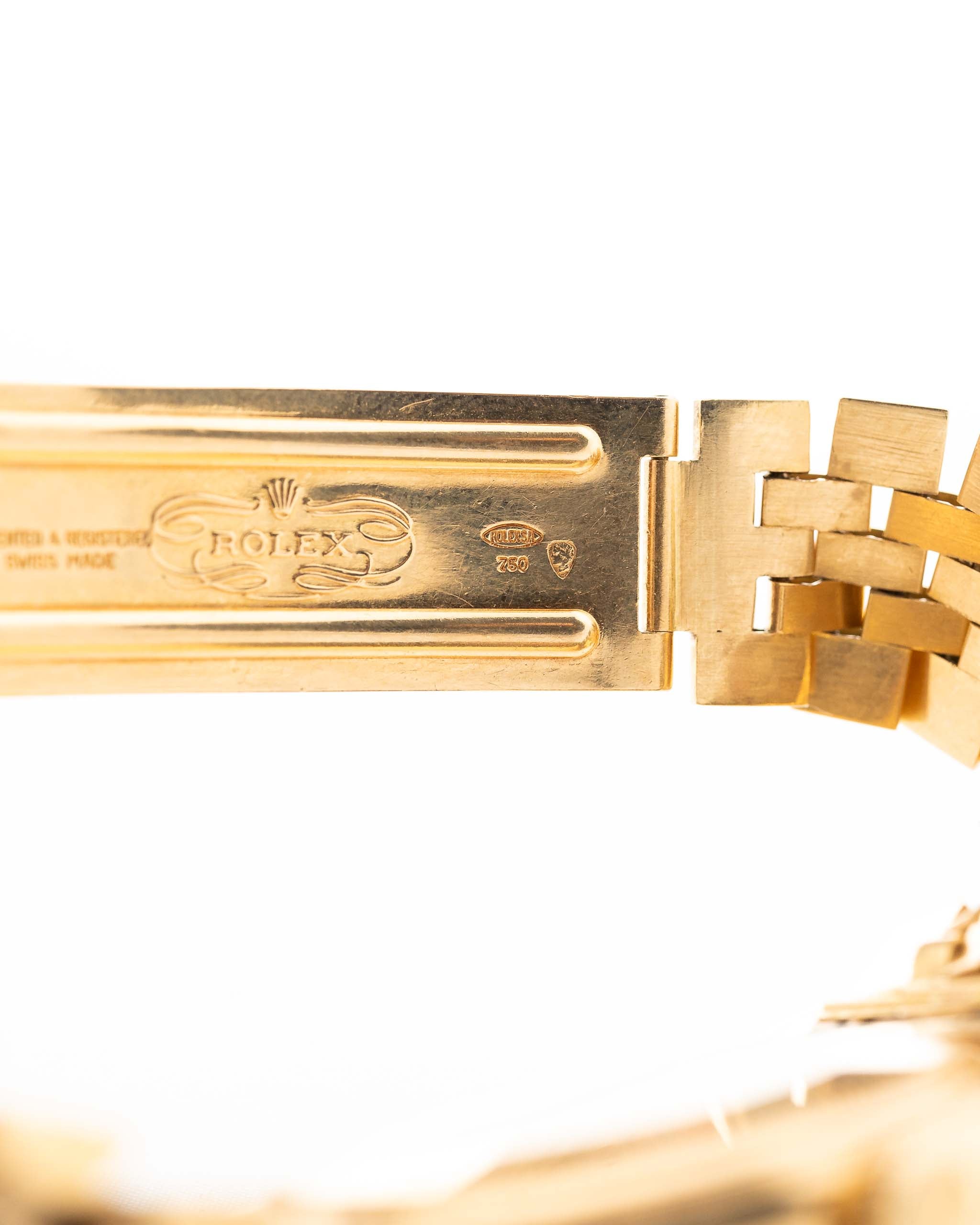 Closeup Photo of a Rolex 1601 Datejust 18k Malachite Jubilee clasp. From 1968, 36mm in 18K Yellow Gold with Original Malachite Dial, Automatic Caliber 1570 and Original Jubilee Bracelet.