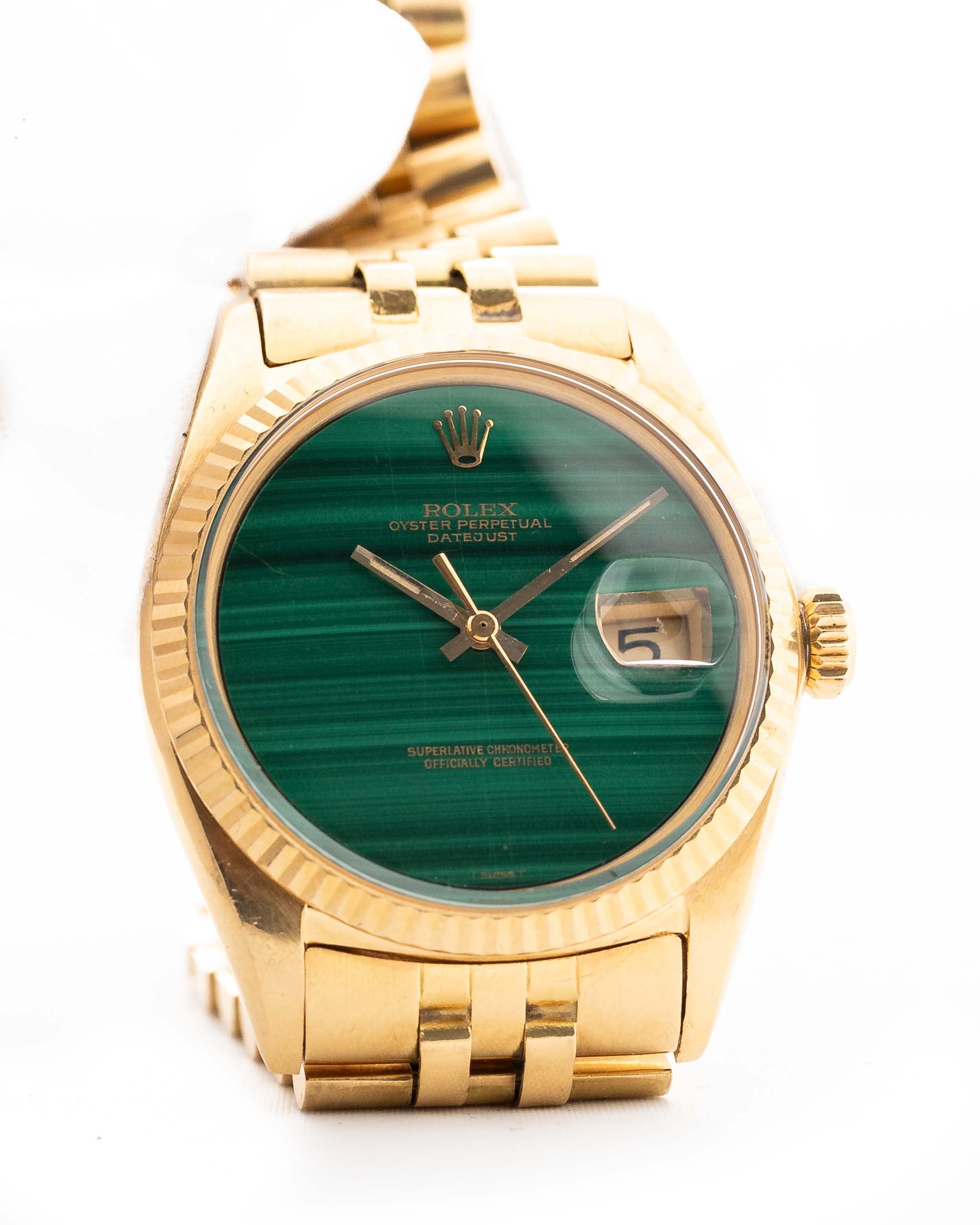 Closeup Photo of a Rolex 1601 Datejust 18k Malachite. From 1968, 36mm in 18K Yellow Gold with Original green Malachite Dial, Automatic Caliber 1570 and Original Jubilee Bracelet.